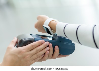 Woman Use Of Smart Watch To Pay