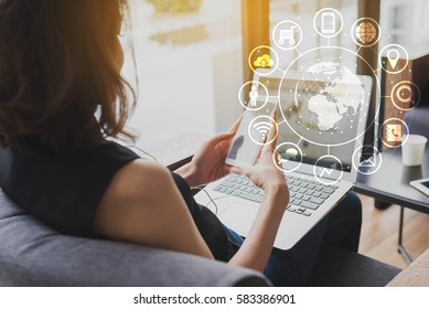 Woman use smartphone and laptop, internet of things conceptual, globalization omni channel communication