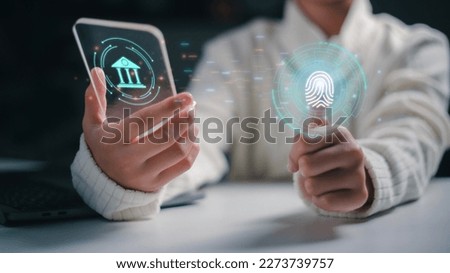 Woman uses fingerprint identification to access personal financial data. The idea for E-KYC, biometrics security, and innovation technology against digital cybercrime
