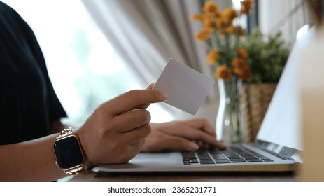 woman uses smart tablet computer and holds credit card with online shopping.Online payment concept. - Shutterstock ID 2365231771