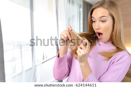 woman uses a smartphone