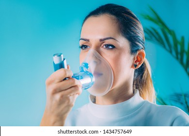 Woman Using Asthma Inhaler Extension Tube Stock Photo 1434757649 ...