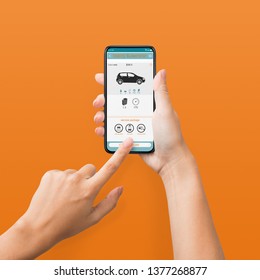 Woman Using Cellphone With Car Rent App On Screen, Orange Background, Pov