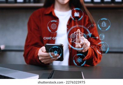Woman using chatbot in computer and tablet  smart intelligence Ai.Chat GPT Chat with AI Artificial Intelligence, developed by OpenAI generate. Futuristic technology, robot in online system. in office - Shutterstock ID 2276323975