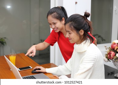 The woman using a computer