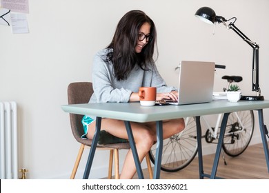 Woman using computer laptop - Shutterstock ID 1033396021