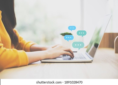 Woman using computer laptop on wood desk. Online live chat chatting on application communication digital media website and social network - Shutterstock ID 1891028470