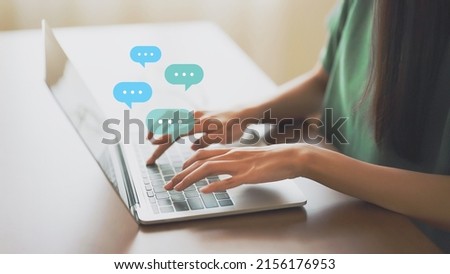 Woman using computer laptop on wood desk. Online message live chat chatting on application communication digital media website and social network
