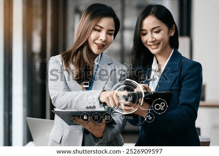Woman using computer, tablet and presses his finger on the virtual screen inscription Hosting on desk, Web hosting concept, Internet, business, digital technology concept.