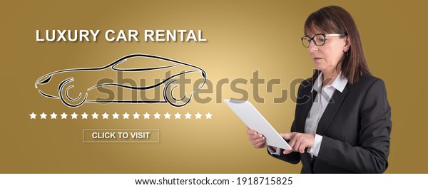 Woman using digital tablet with luxury car\
rental concept on\
background
