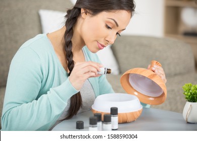 A Woman Using Essential Oil