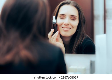 
Woman Using Face Serum During Nighttime Skin Routine. Happy lady with mature complexion applying cosmetic product
 - Shutterstock ID 2167608029