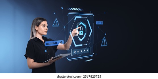 Woman using a futuristic holographic interface with a padlock icon, holding a tablet, on a dark gradient background, concept of cybersecurity
