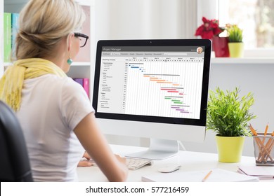 Woman Using Gantt Chart For Project Management