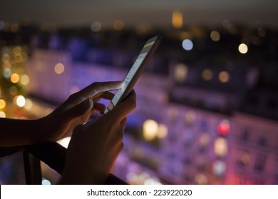 Woman Using Her Mobile Phone, City Skyline Night Light  Background