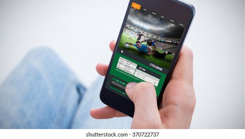 Woman Using Her Mobile Phone Against Sport App