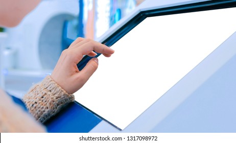 Woman Using Interactive Digital Informational Kiosk With Touchscreen Display At Urban Exhibition - Scrolling And Touching. Education, Mockup, Template And Technology Concept