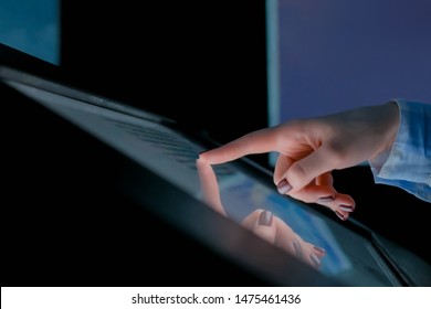 Woman using interactive touchscreen display of electronic multimedia kiosk at modern history museum. Education, learning and technology concept - Shutterstock ID 1475461436