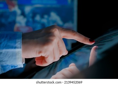 Woman using interactive touchscreen display of electronic multimedia kiosk at modern history museum. Education, learning and technology concept - Shutterstock ID 2139452069