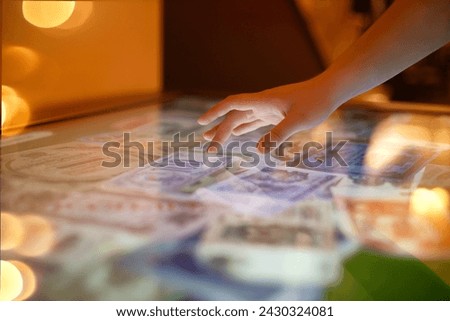 woman using interactive touchscreen display of electronic kiosk
