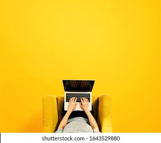 Woman Using A Laptop Computer Overhead View