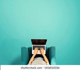 Woman Using A Laptop Computer Overhead View