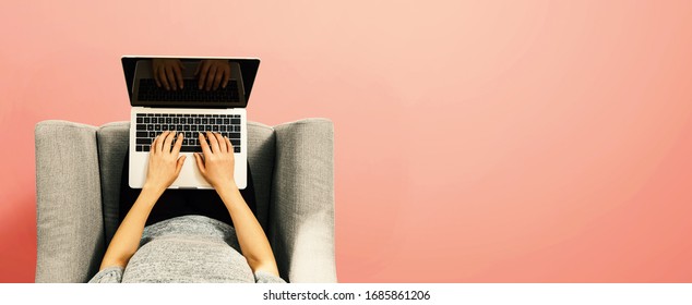 Woman Using A Laptop Computer Overhead View