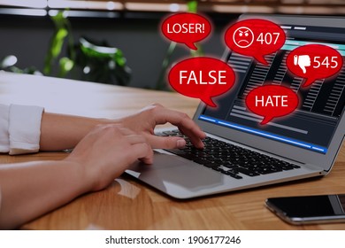 Woman Using Laptop And Icons With Offensive Messages, Closeup. Cyber Bulling Concept