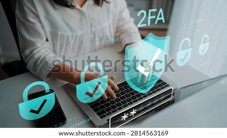 Woman using laptop to implement two-factor authentication with digital security icons for enhanced online protection and privacy measures in modern technology Gluon.