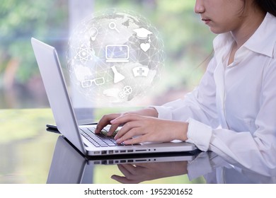 Woman using laptop with Smart services icons, concept of internet of things, new technology big data and business process strategy, customer service, cloud computing, learning online. - Powered by Shutterstock