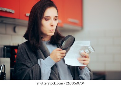 
Woman Using A Magnifier Glass To Read Medicine Leaflet Of Pills. Careful Patient Checking Medication Instructions For Safe Use 
