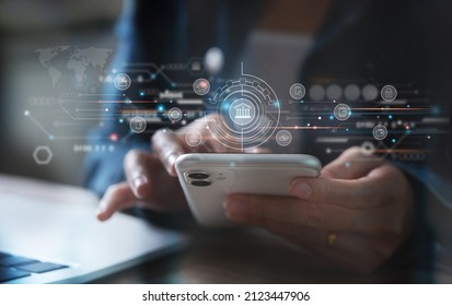 Woman using mobile online banking and payment, Digital marketing. Finance and banking networking. Online shopping and internet network connection, cyber security. Business technology. - Shutterstock ID 2123447906