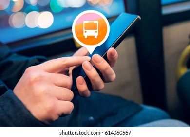 Woman using mobile phone app to purchase electronic ticket for bus public transportation, close up of female hands with smartphone, selective focus
