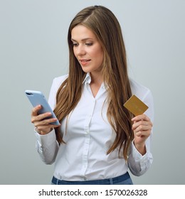 Woman using mobile smart phone and credit card for online payment. isolated female portrait. - Shutterstock ID 1570026328