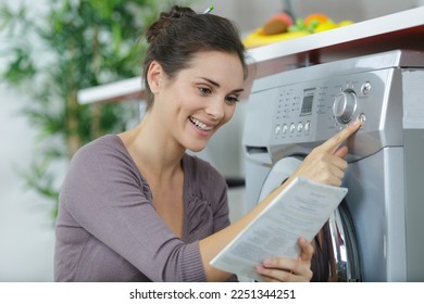 woman using new washing machine