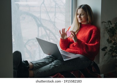 Woman Using Online Dating App On Laptop. Valentines Day, Dating, Meeting During The Coronavirus Outbreak. Love At Distance In The Time Of Coronavirus