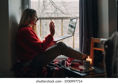 Woman Using Online Dating App On Laptop. Valentines Day, Dating, Meeting During The Coronavirus Outbreak. Love At Distance In The Time Of Coronavirus