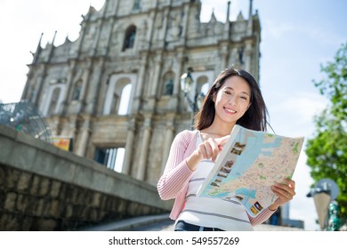 Woman using paper in Macau - Shutterstock ID 549557269