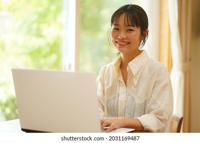 Woman using a personal computer 
