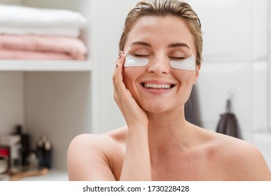 Woman Using Reducing Dark Circles Patches 