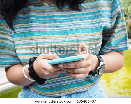 Similar – Young Woman Checking Her Mobile Phone