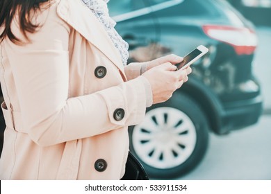 Woman Using Smart Phone And Call The Car Insurance.