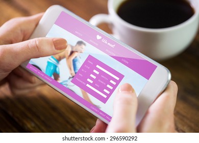 Woman Using Smartphone Against Dating Website