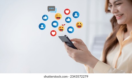 Woman using smartphone sending emojis. Happy woman using phone to chat online with friends. 3d emoji icon.