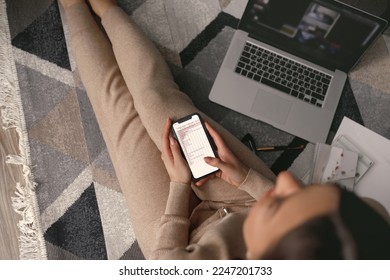 Woman using smartphone and working at laptop computer hands close up. Payment.  Online shopping concept.Concept of blogging - Shutterstock ID 2247201733