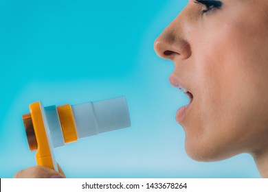 Woman Using Spirometer  Measuring Lung Capacity