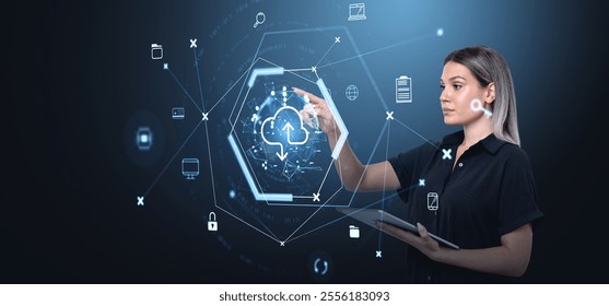 Woman using a tablet, interacting with virtual cloud storage icons in a futuristic digital interface. Blue glowing background. Concept of online data - Powered by Shutterstock