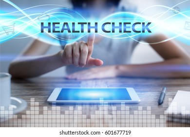 Woman Using Tablet Pc, Pressing On Virtual Screen And Selecting Health Check.