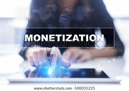 Woman is using tablet pc, pressing on virtual screen and selecting monetization