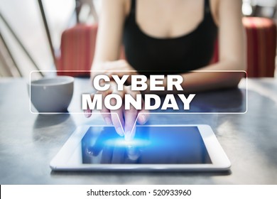 Woman using tablet pc and selecting cyber monday.